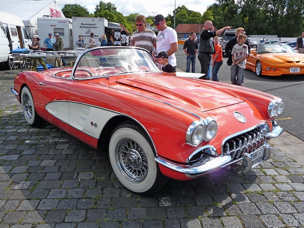 Red classic Corvette at car show