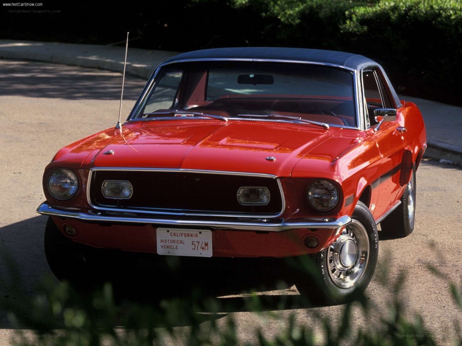 Red classic Ford Mustang