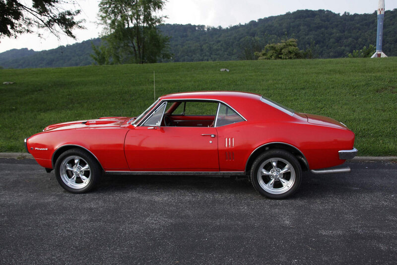 Red Classic Muscle Car — Calm, Afternoon, Photograph, Grass Field, Trees