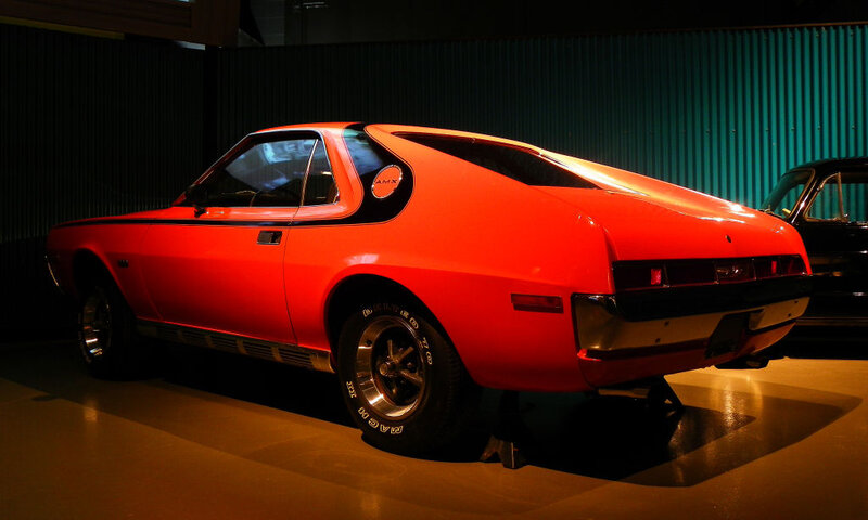 Red classic muscle car on display
