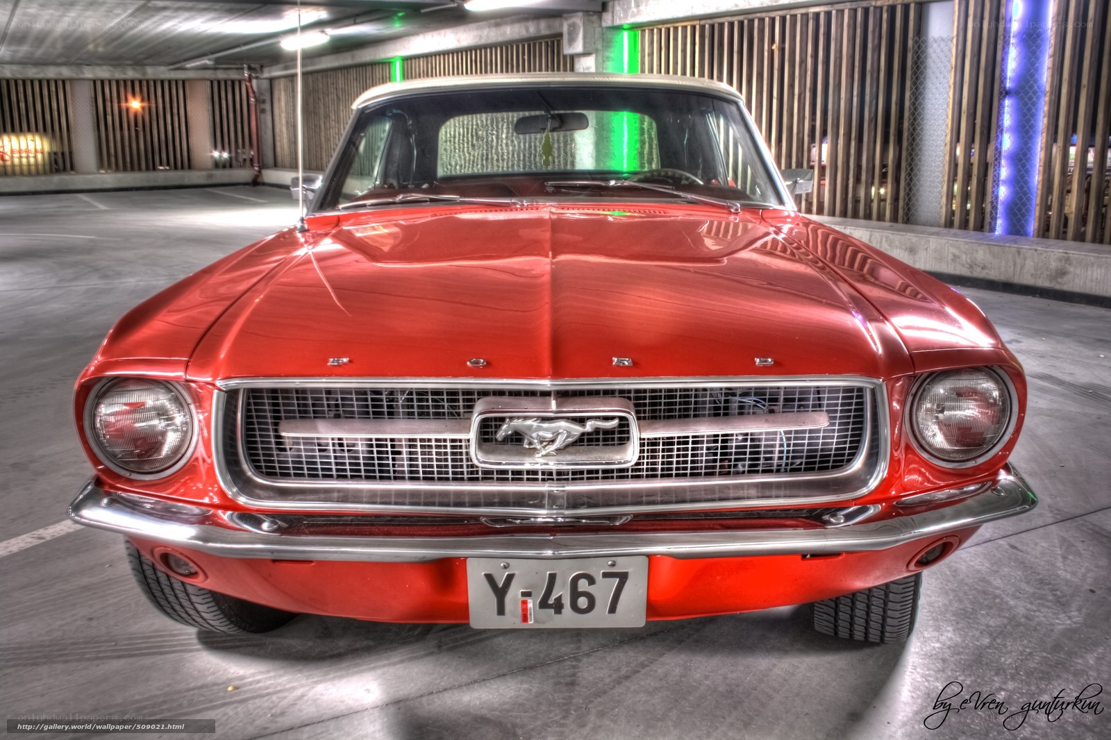 Red classic Mustang in garage