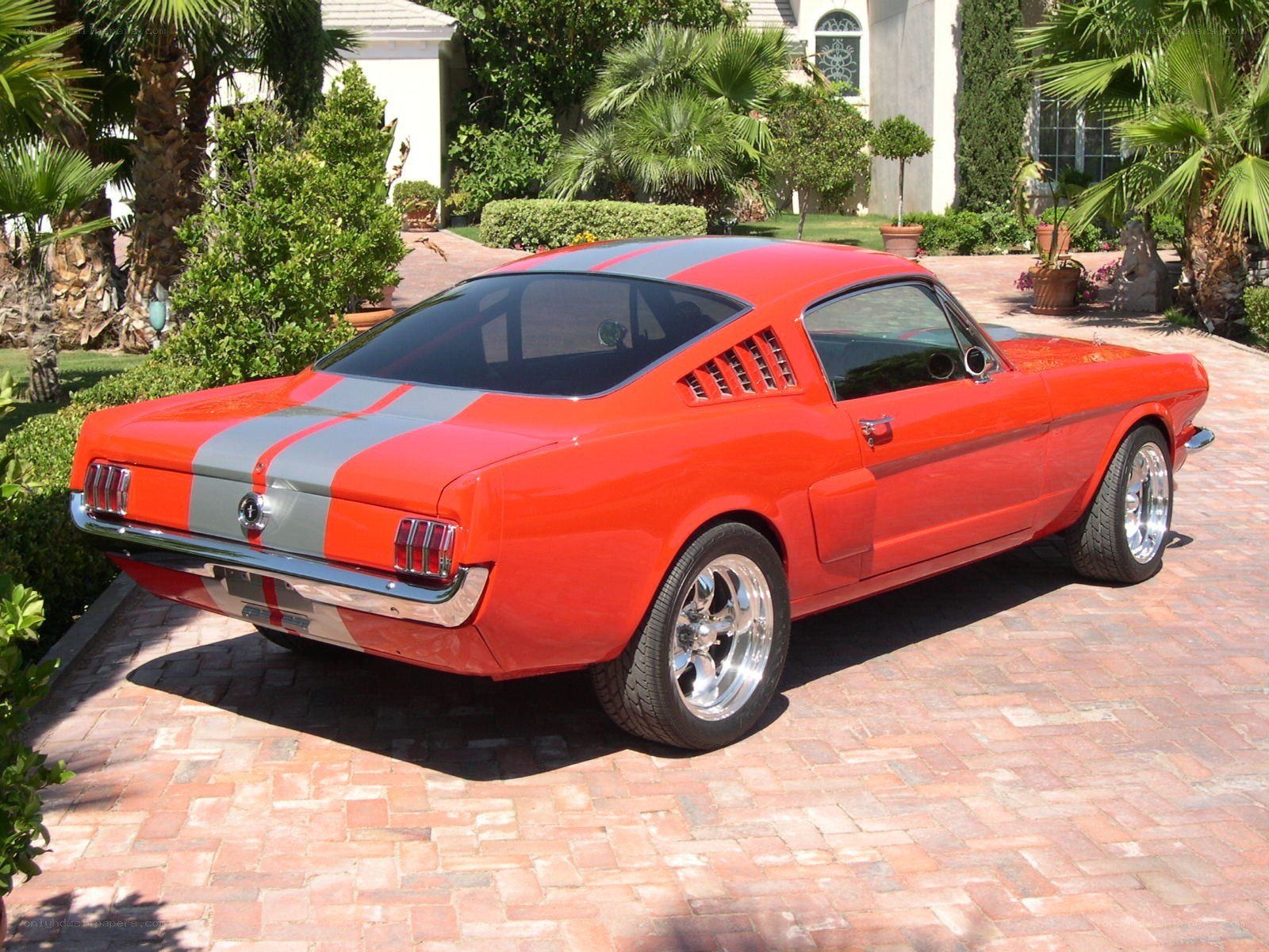 Red classic Mustang with stripes