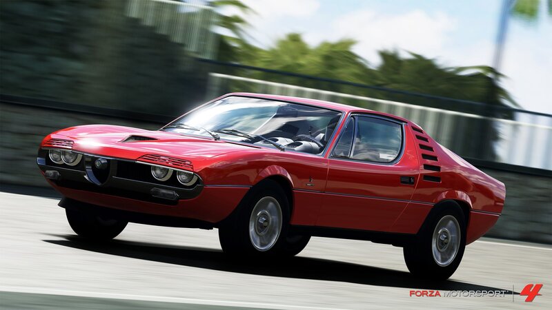 Red classic sports car in motion