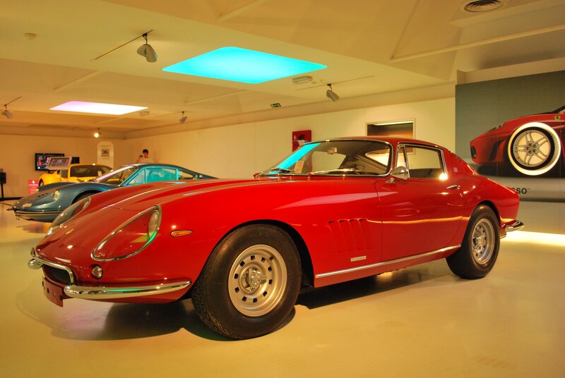 Red classic sports car on display