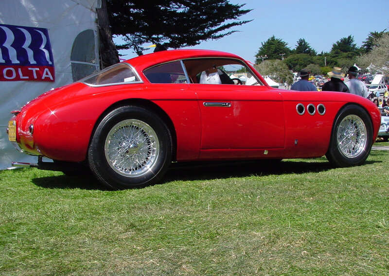 Red classic sports car on display