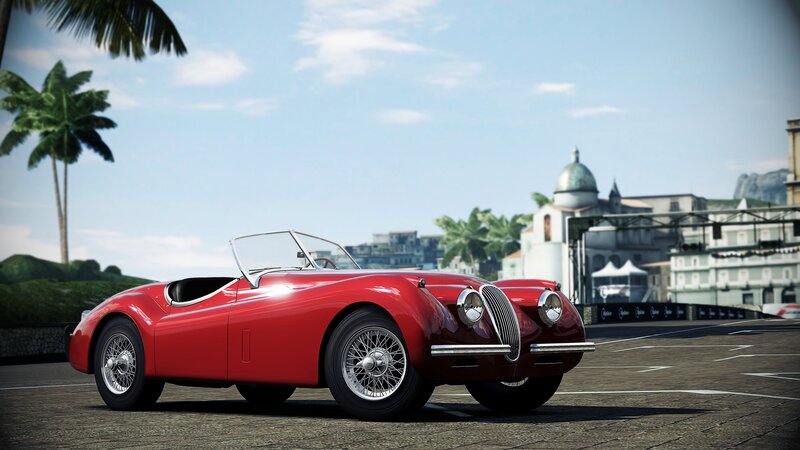 Red classic sports car on track