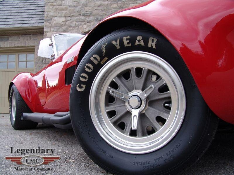 Red classic sports car wheel