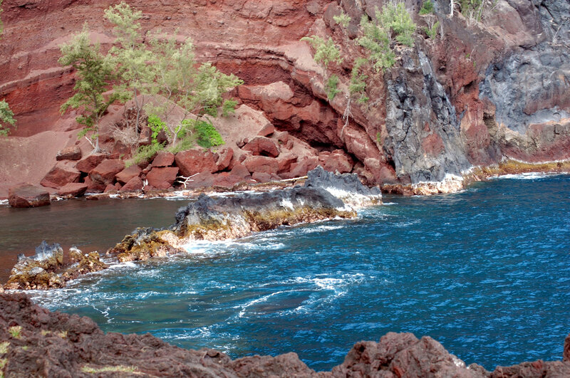 Red cliffs by the ocean
