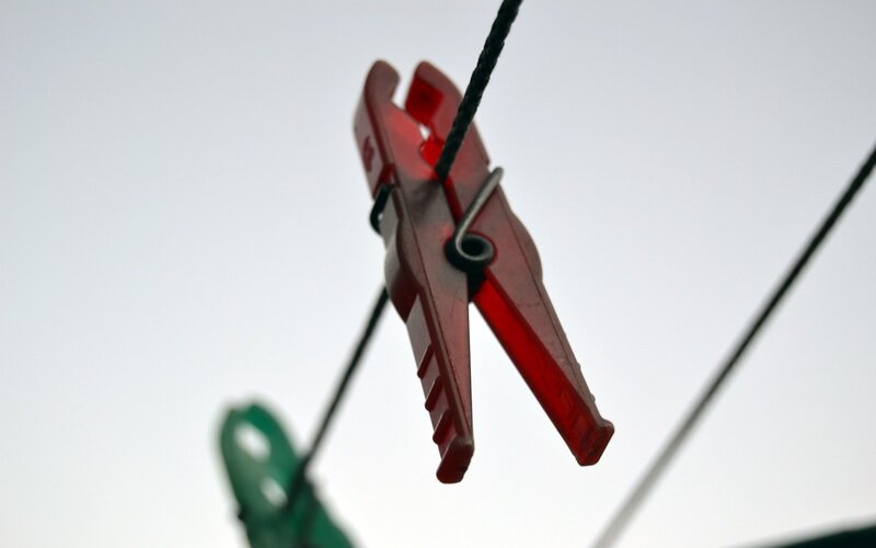 red clothespin on a line