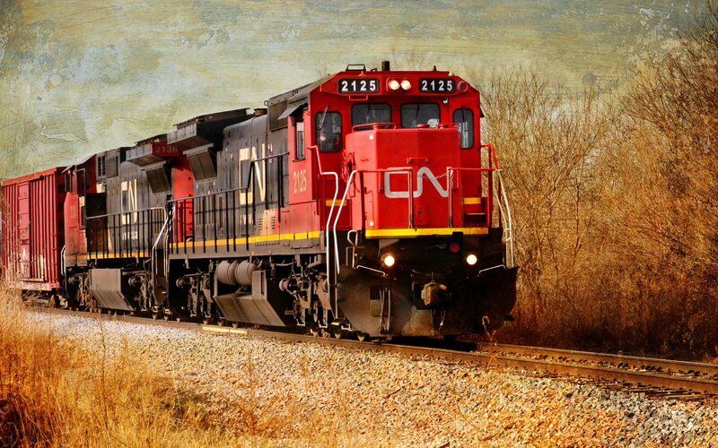 Red CN train on tracks