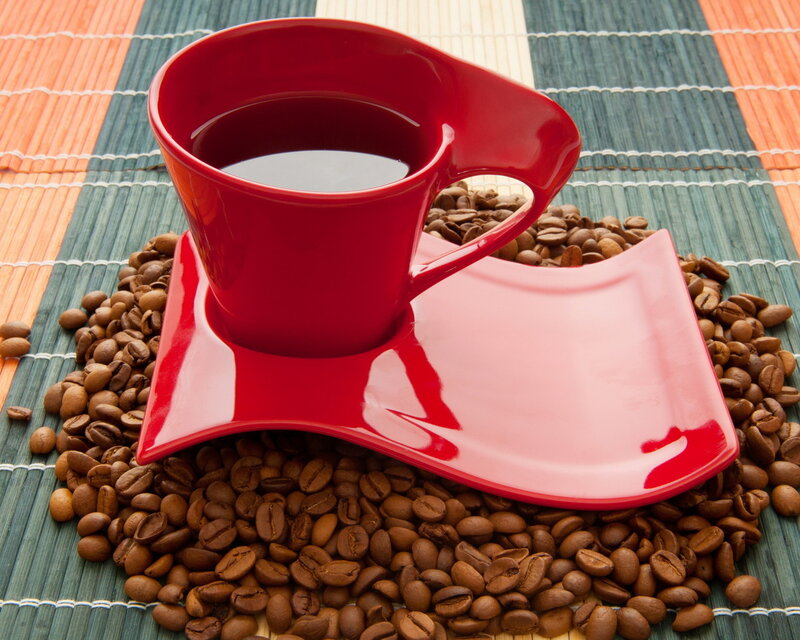 Red Coffee Cup and Beans