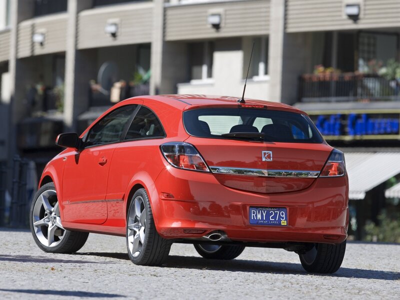 Red compact car rear view