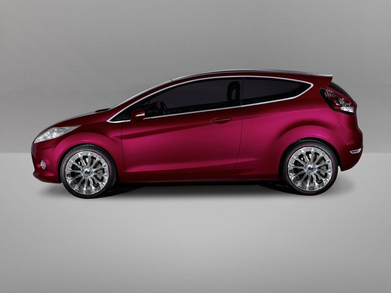red compact car side view
