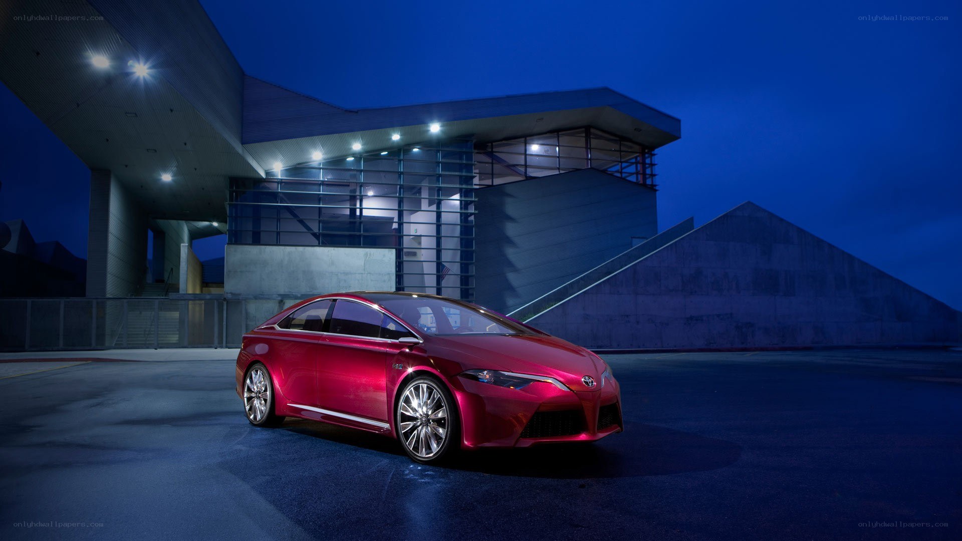 Red concept car at night
