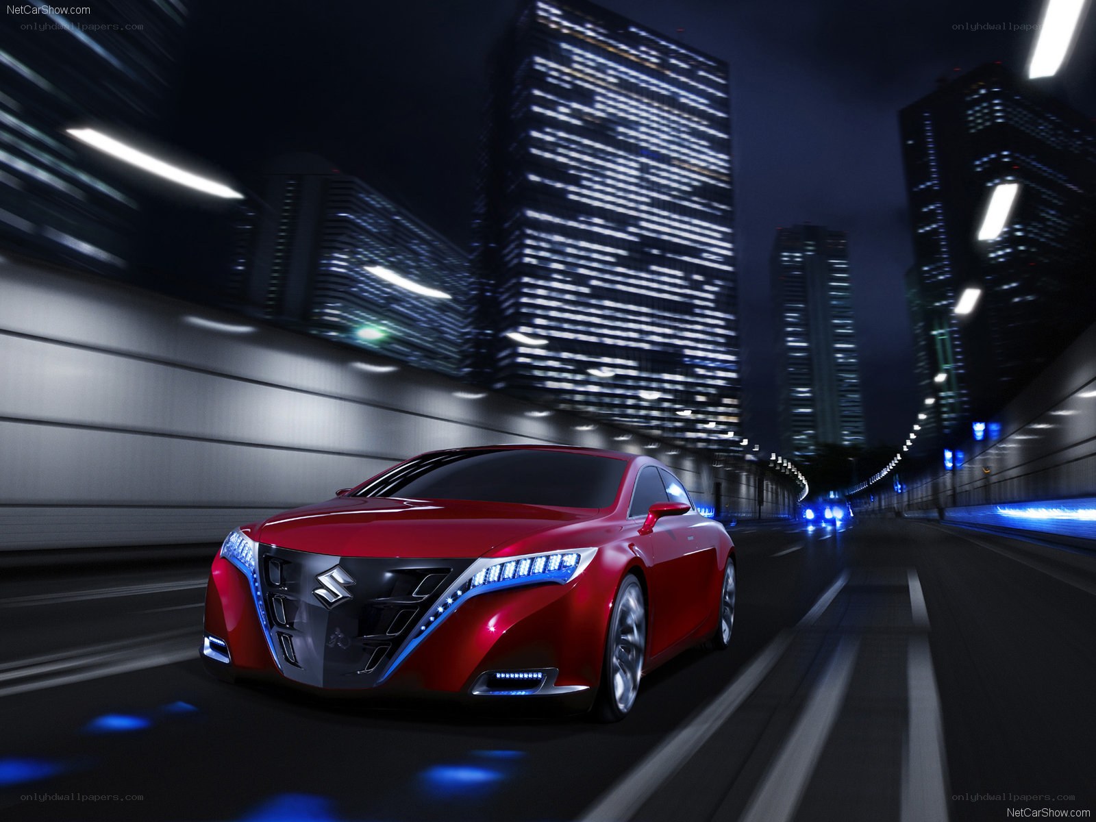 Red concept car at night