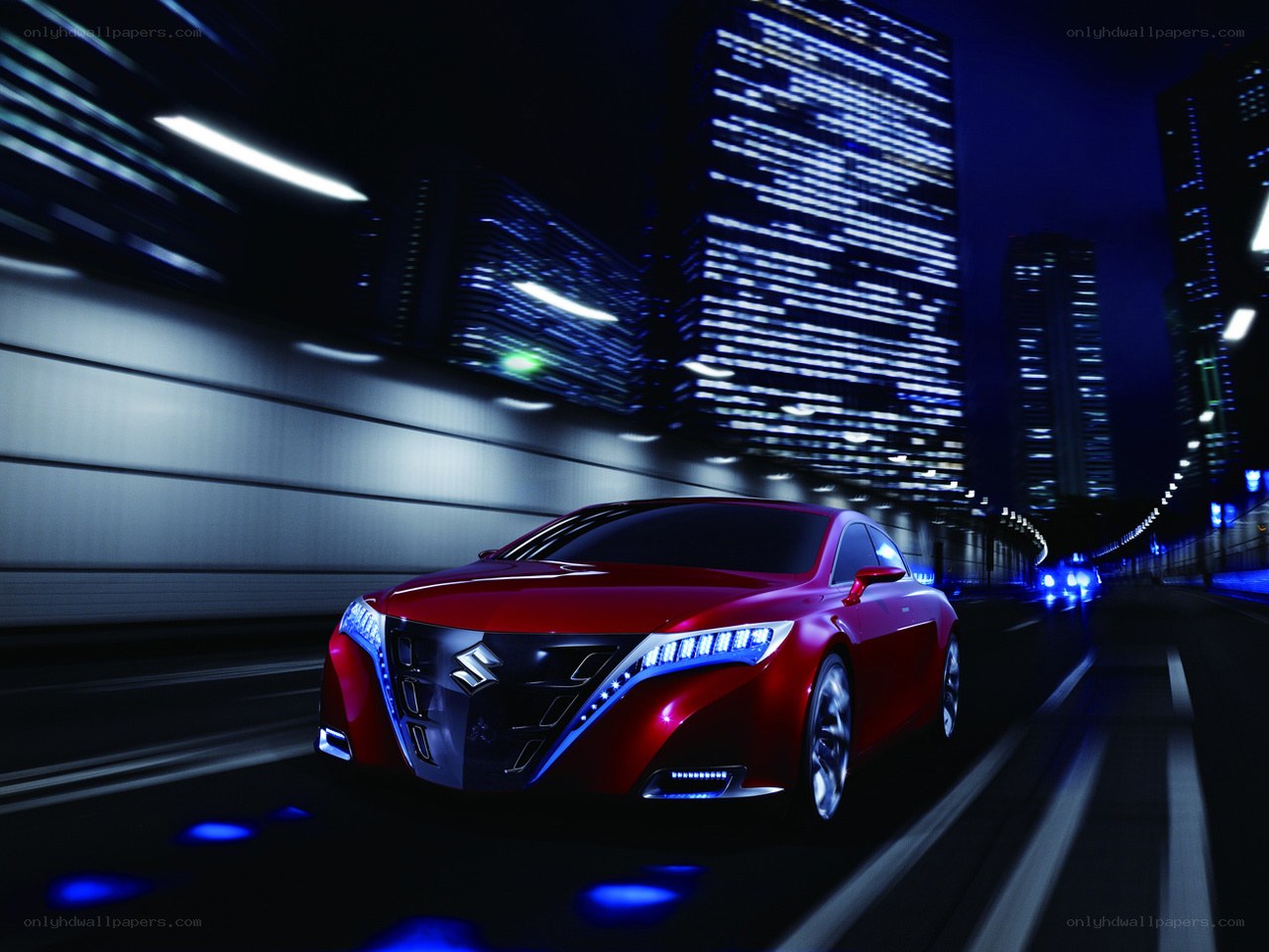 Red concept car at night
