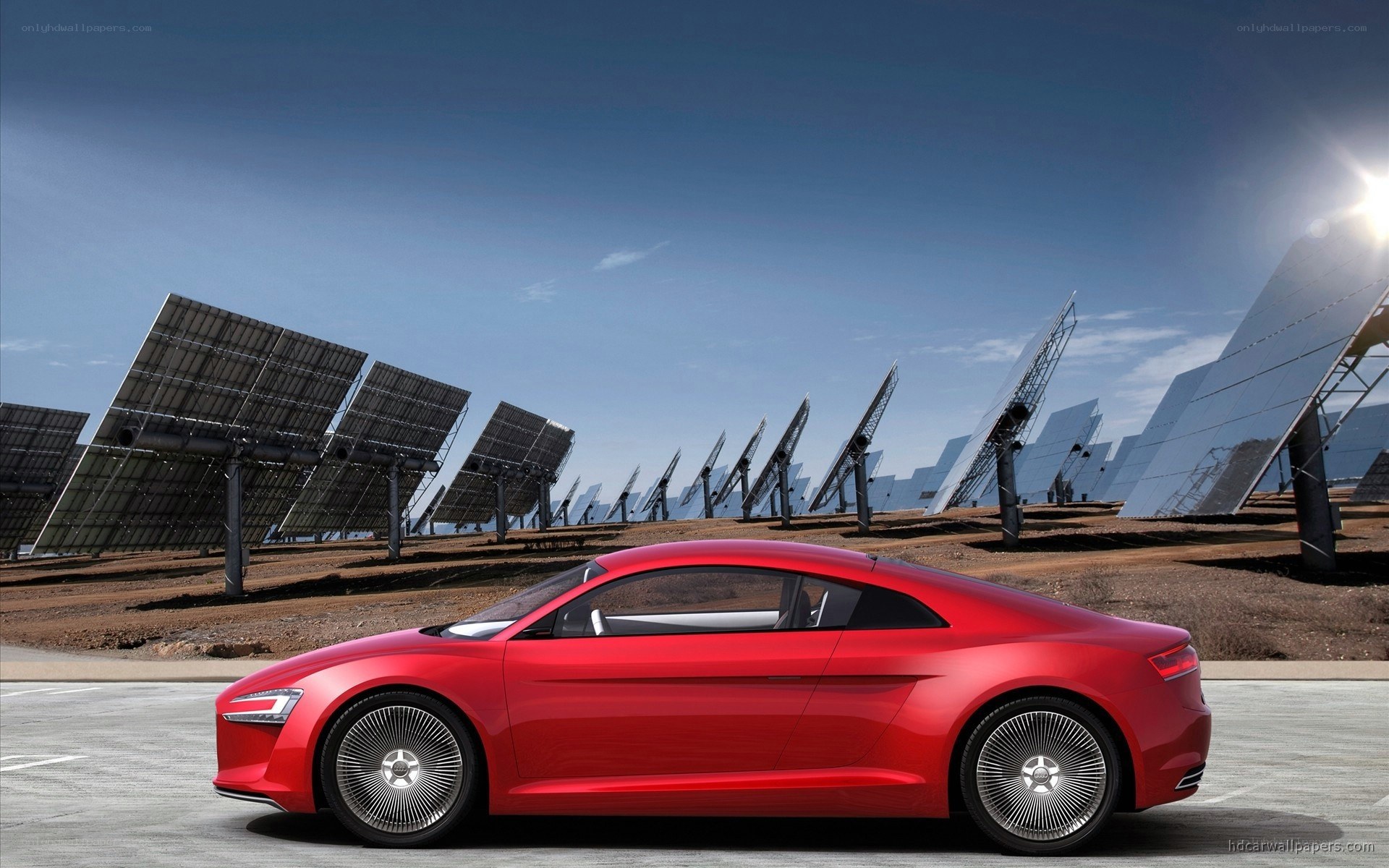Red concept car at solar farm
