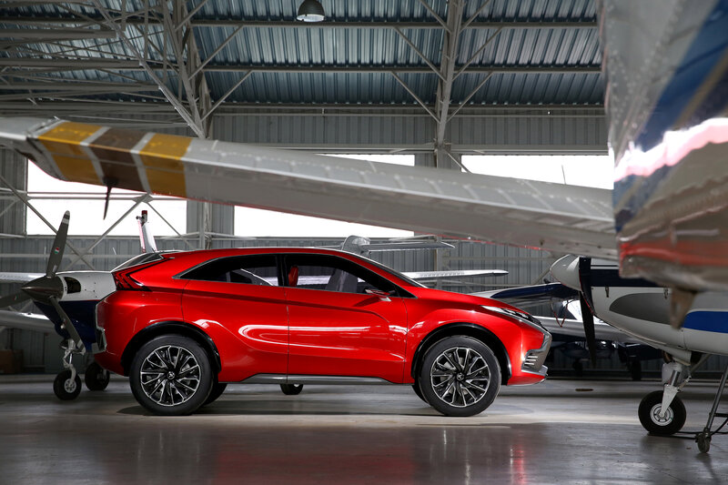 Red Concept Car — Dramatic, Photograph, Airplane