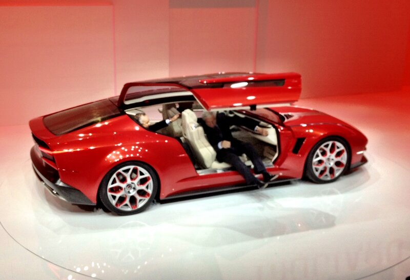 Red Concept Car — Dramatic, Photograph, Man in Suit, White Seats