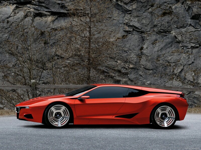 Red Concept Car — Dramatic, Photograph, Rock Wall