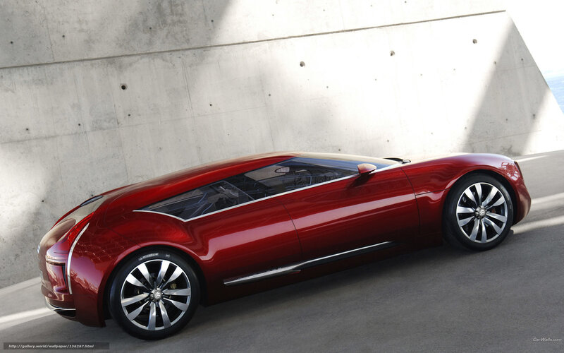 Red concept car in concrete setting
