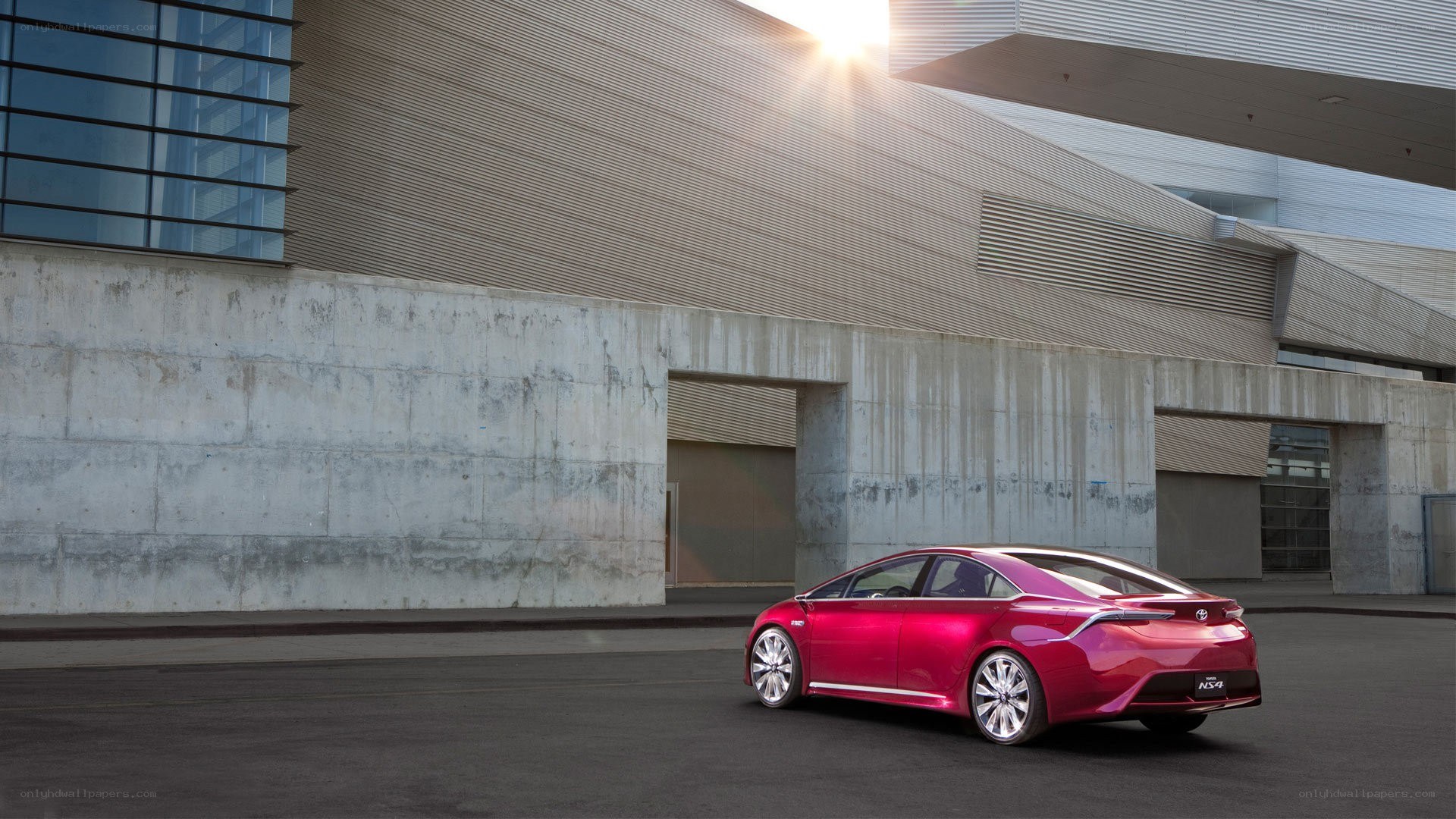 Red concept car in urban setting