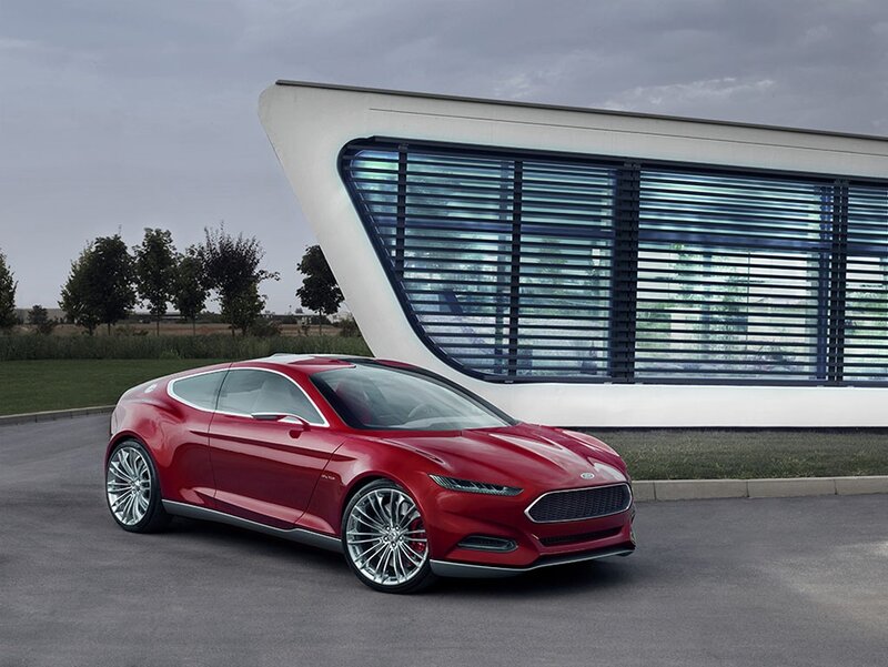 Red Concept Car — Modern, Afternoon, Photograph, Building, Trees, Road, White, Gray