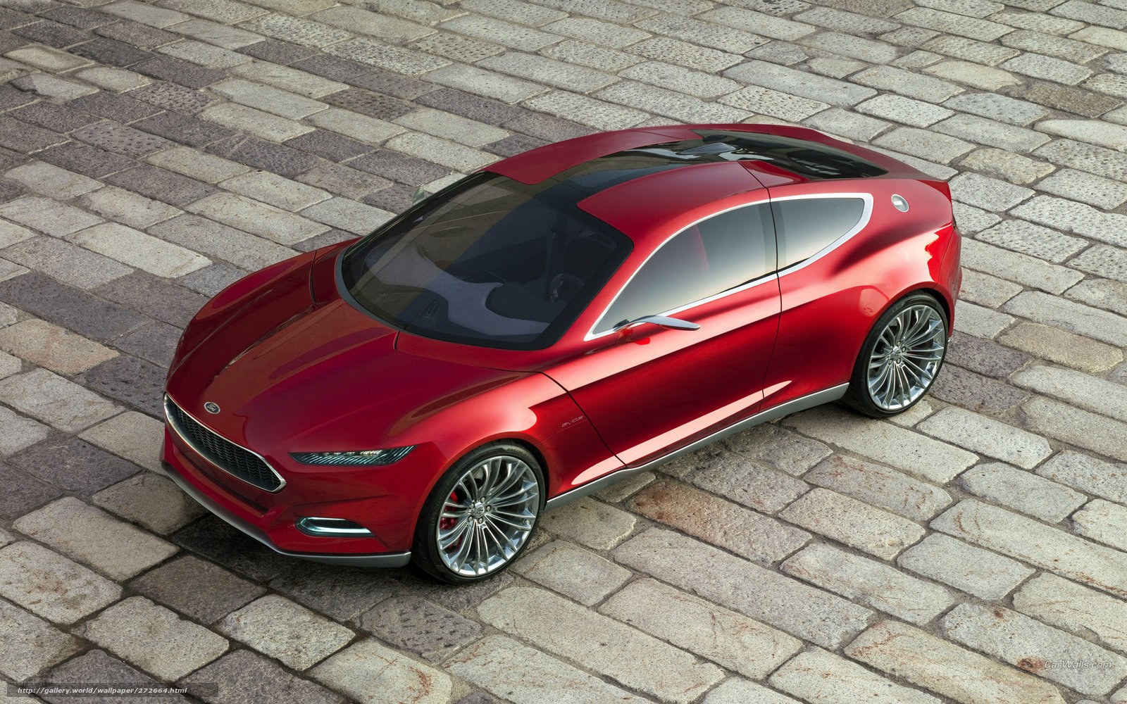 Red concept car on cobblestones