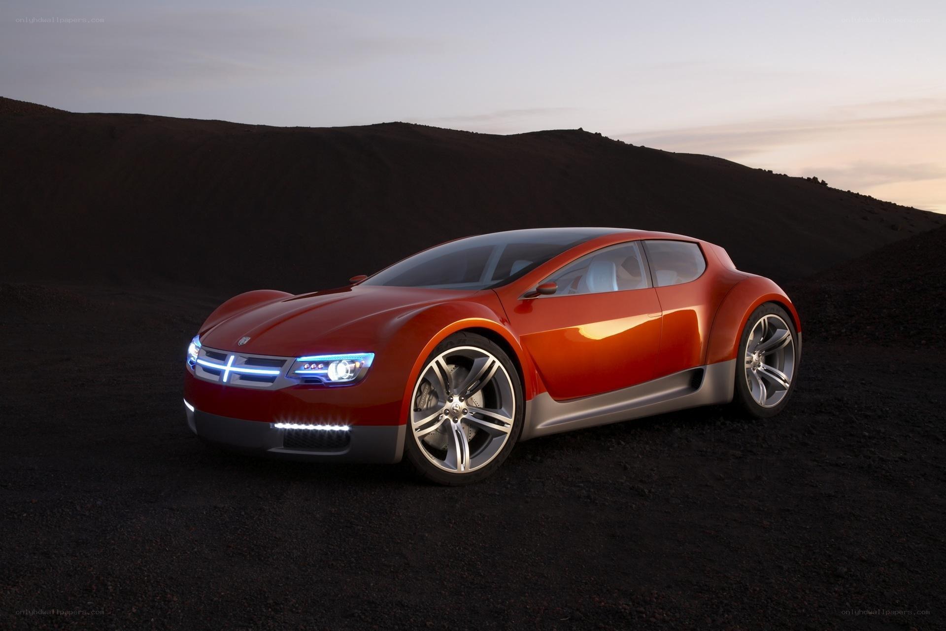 Red concept car on dark terrain