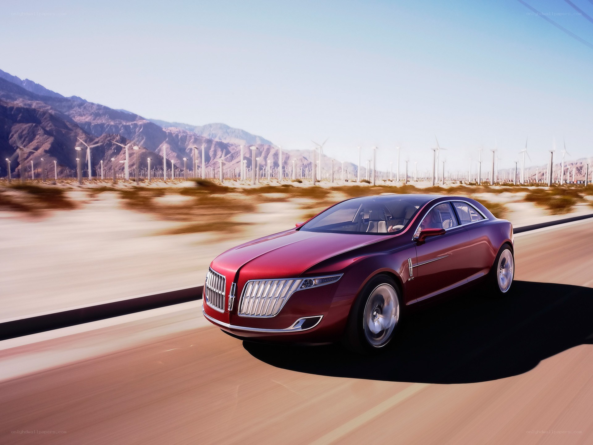 Red concept car on desert road