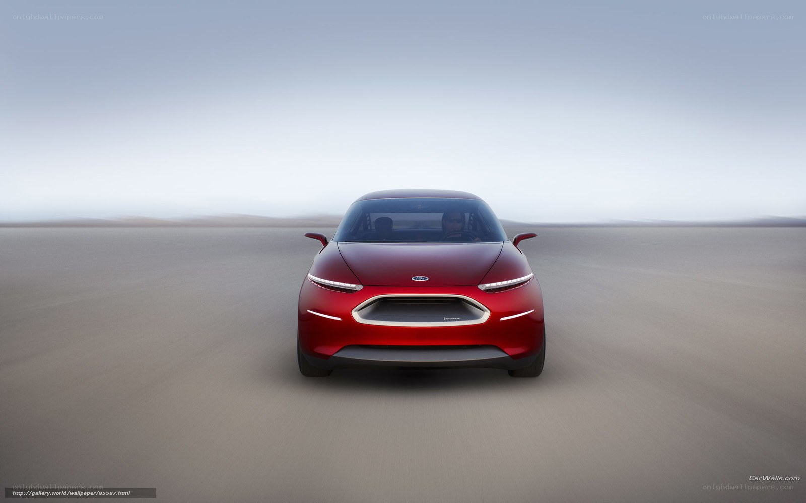 Red concept car on desert road