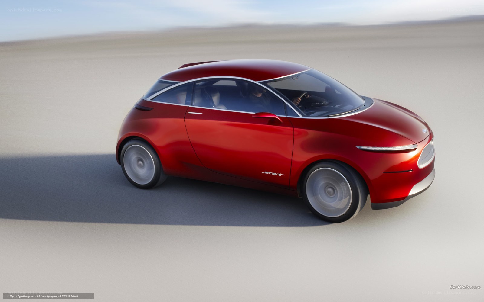 Red concept car on desert