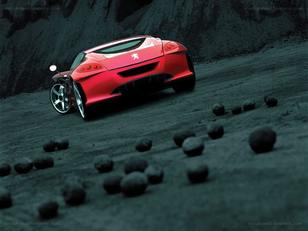 Red concept car on dirt road