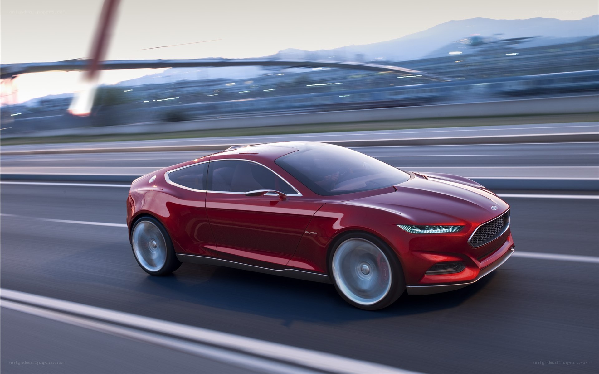 Red concept car on highway
