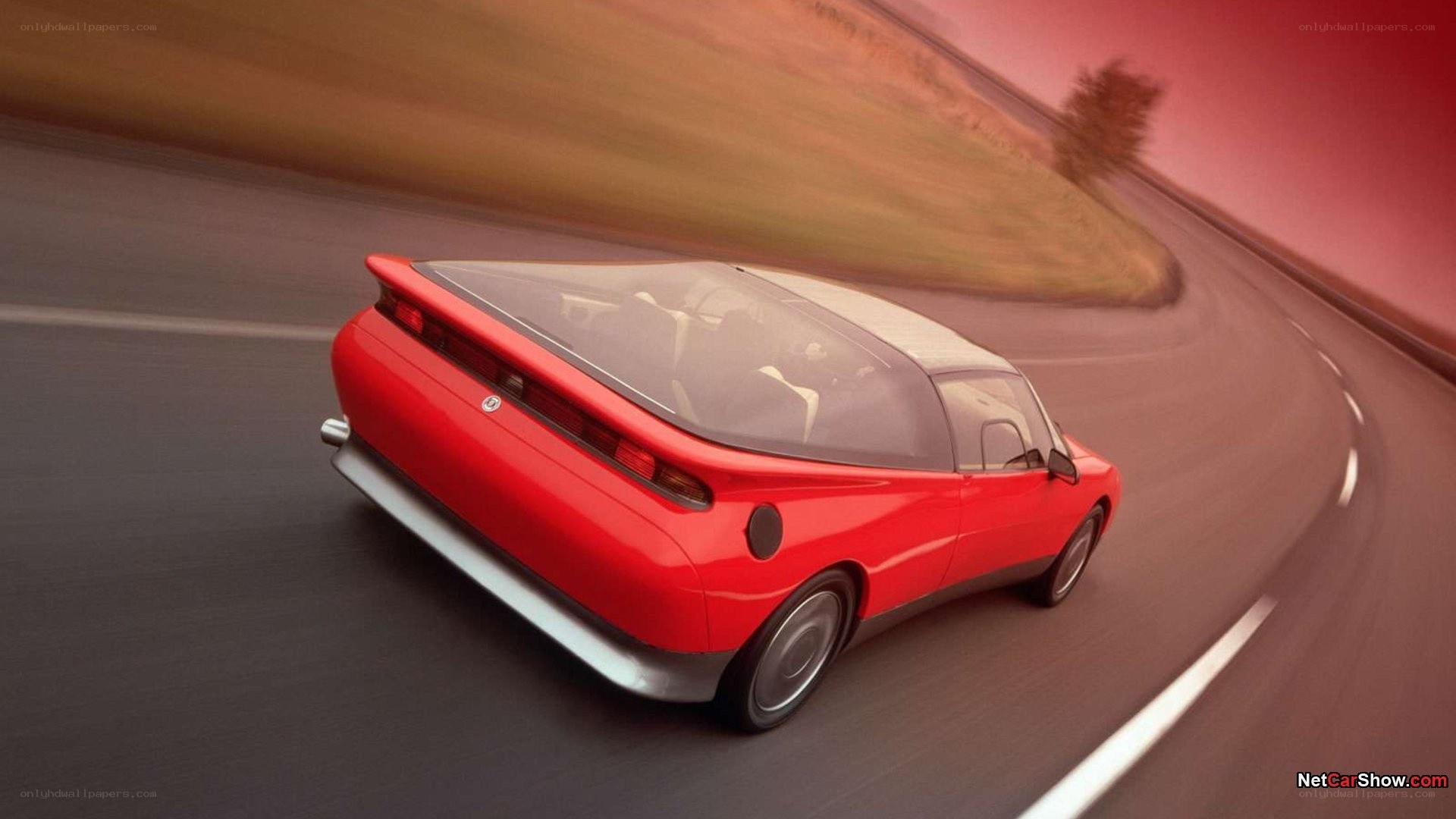 red concept car on road