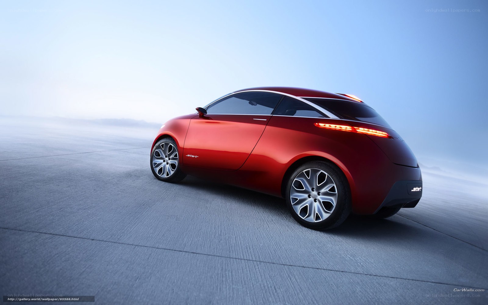 Red concept car on road