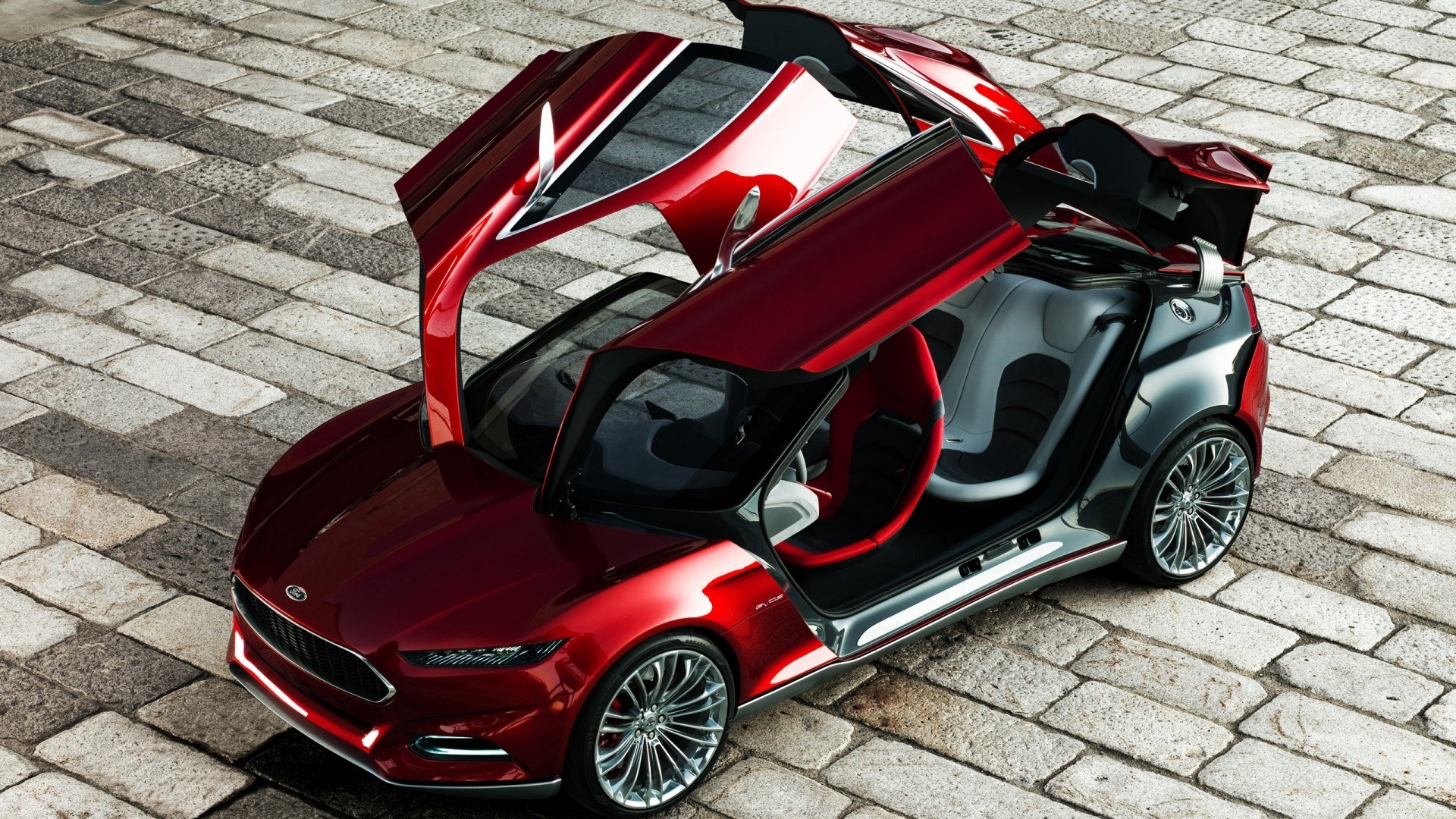 Red concept car with open doors