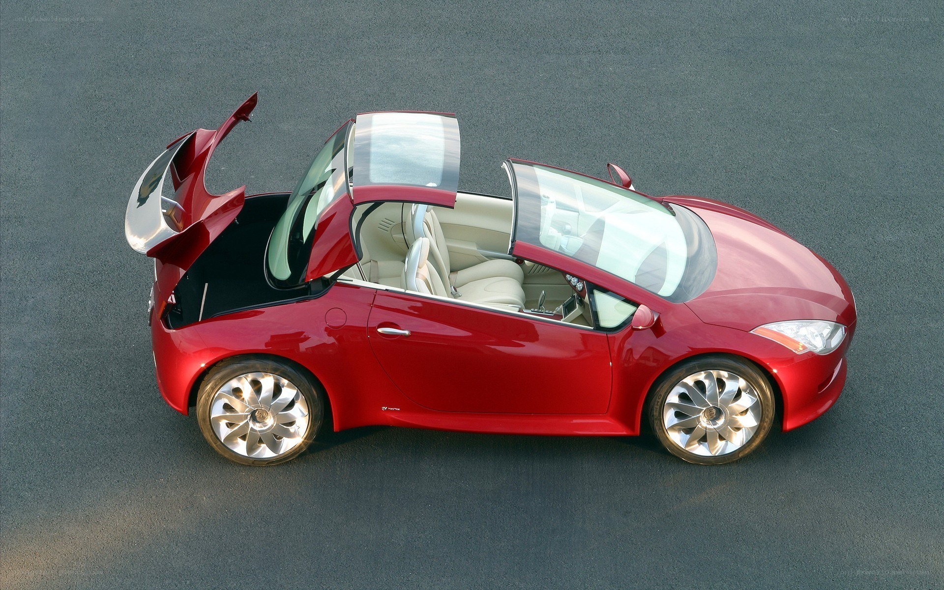 Red concept car with open doors