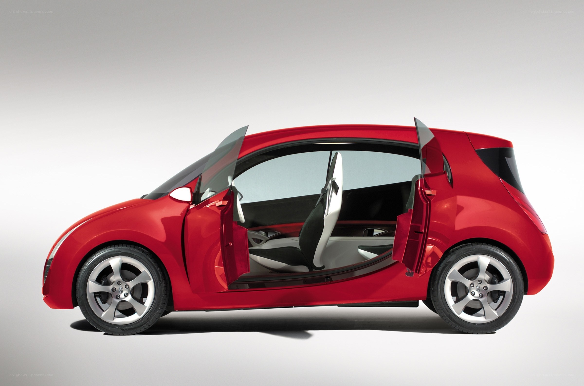Red concept car with open doors