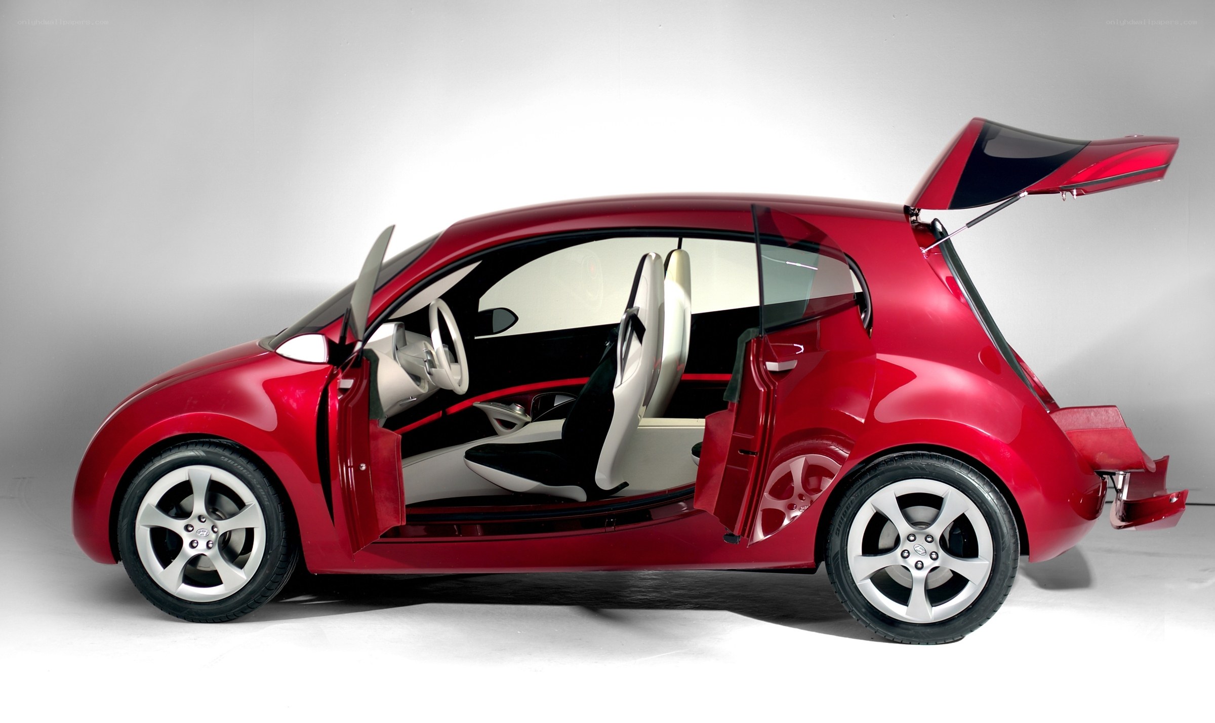 red concept car with open doors