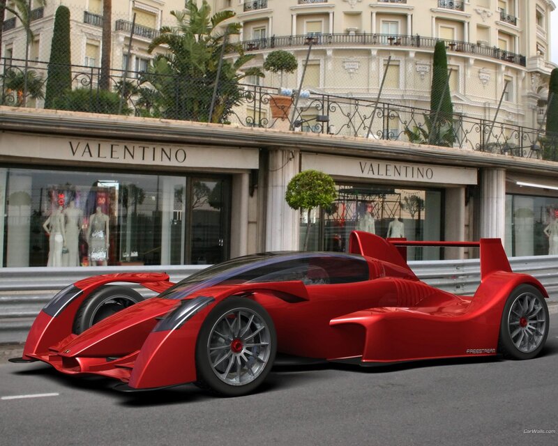 Red concept race car on city street