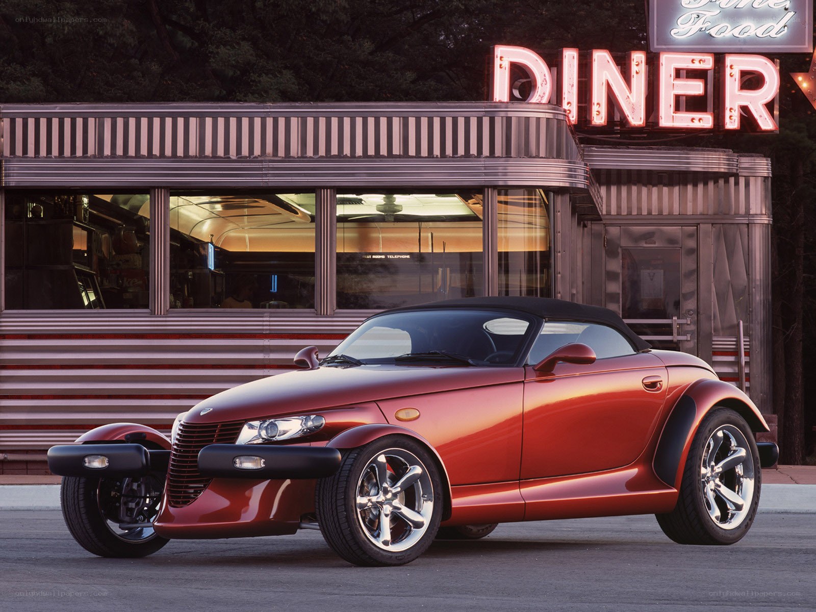 Red convertible at a diner