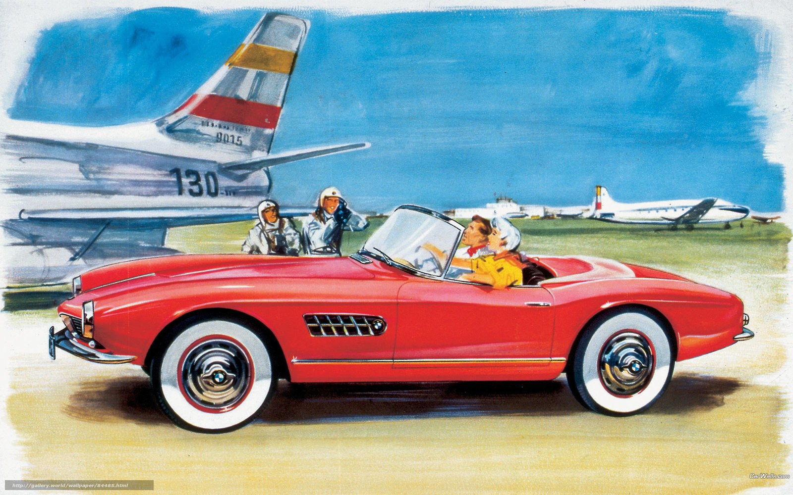 Red convertible at airfield