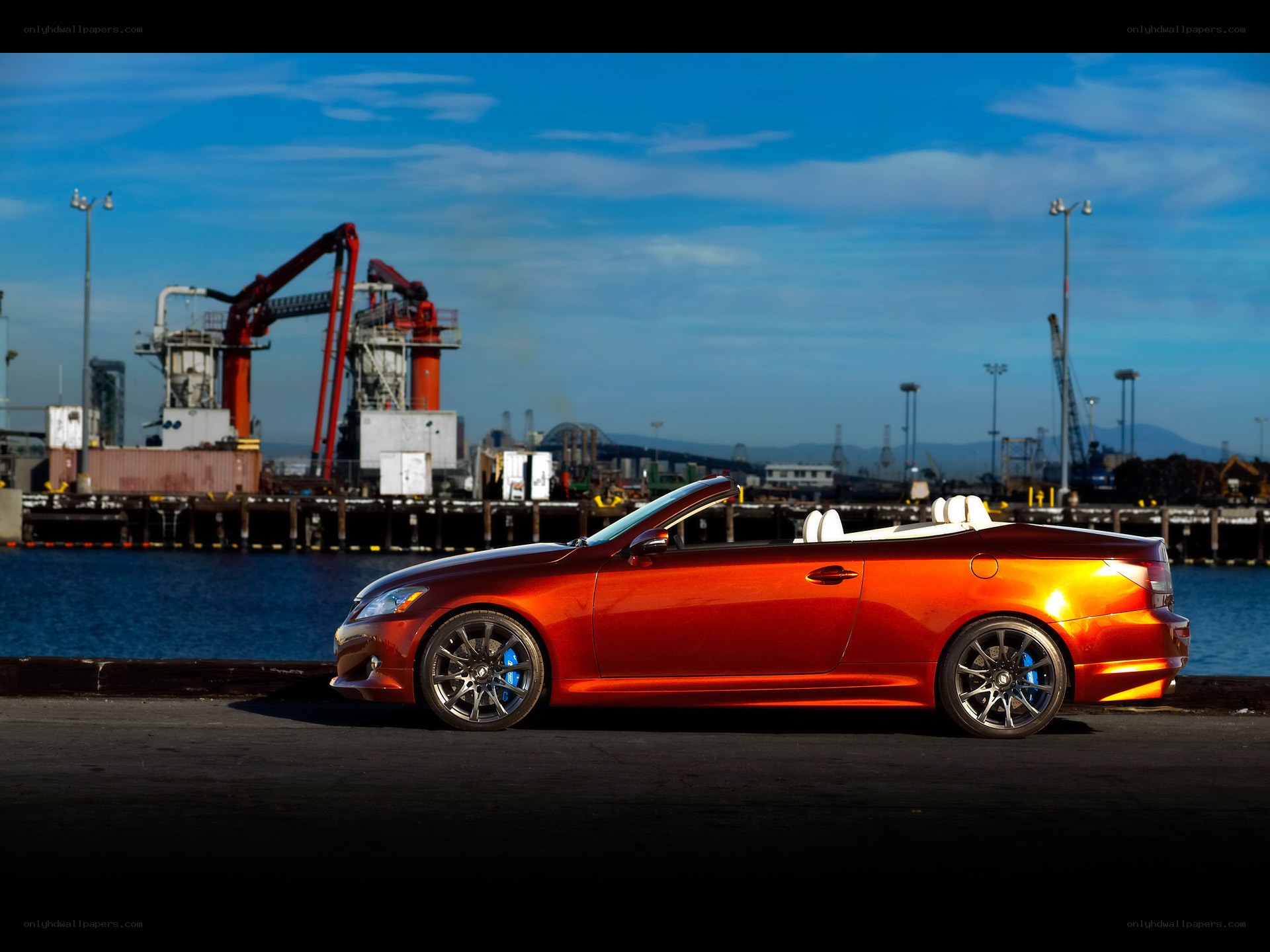 Red convertible at the port