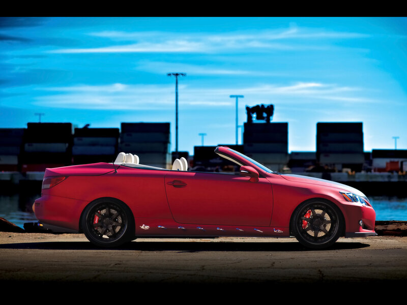 Red convertible car at port