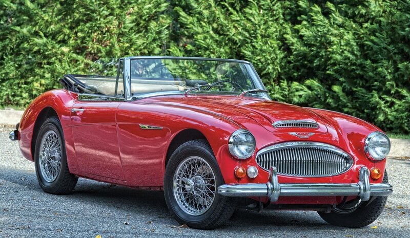 Red Convertible Car — Calm, Afternoon, Photograph, Green Bushes