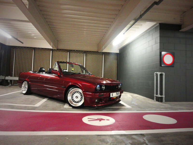 Red Convertible Car — Calm, Photograph, Parking Garage, Concrete Floor