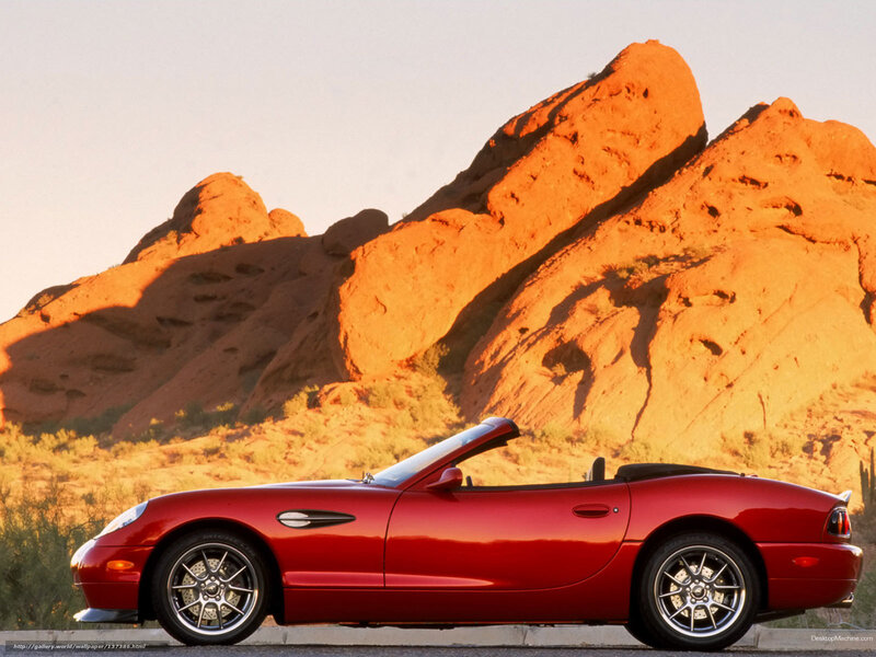 Red Convertible Car — Dramatic, Sunset, Photograph, Rock Formations