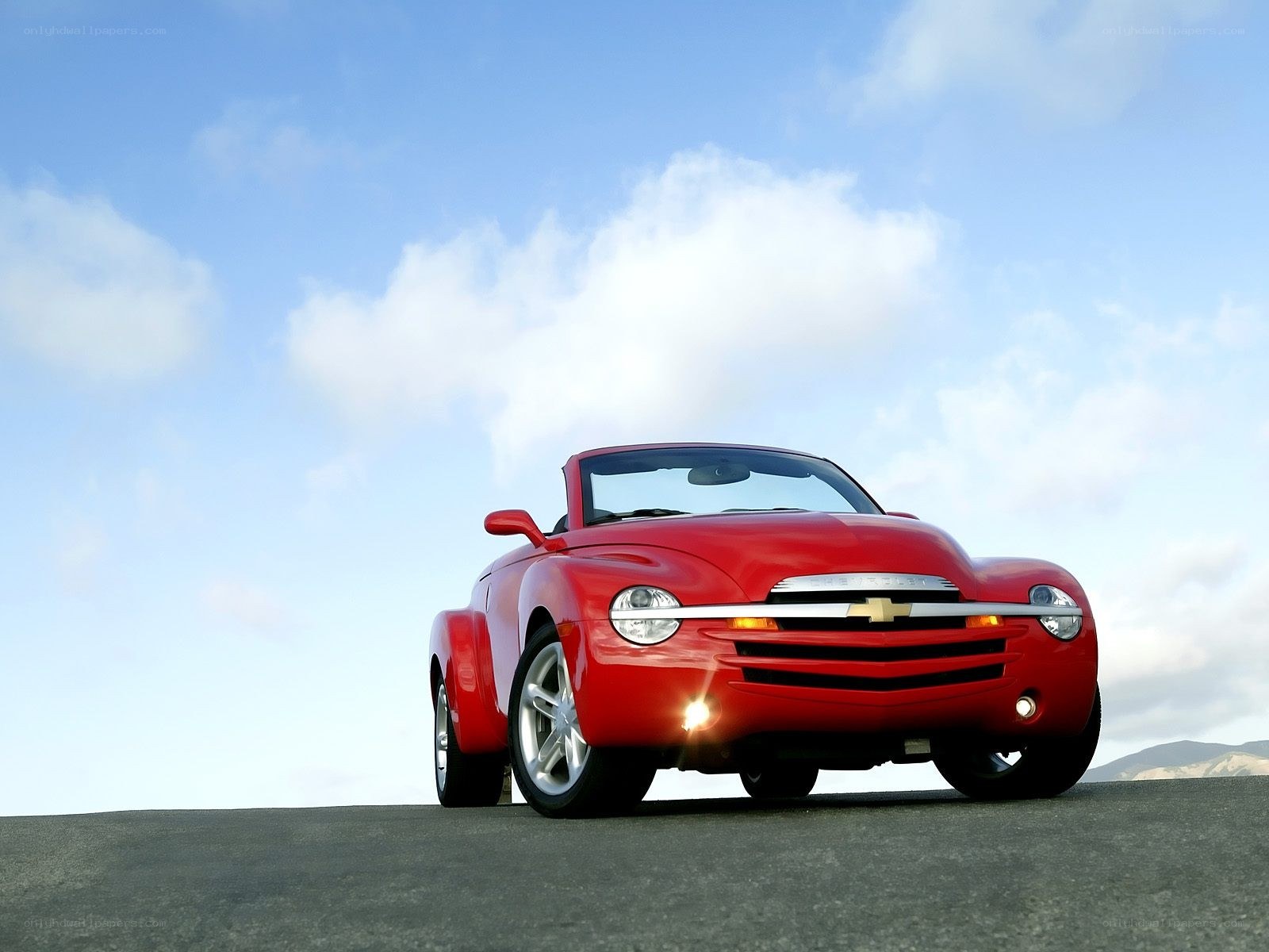 Red convertible car on road