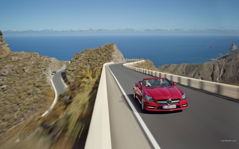 Red Convertible Car — Serene, Afternoon, Photograph, Road, Ocean, Mountain